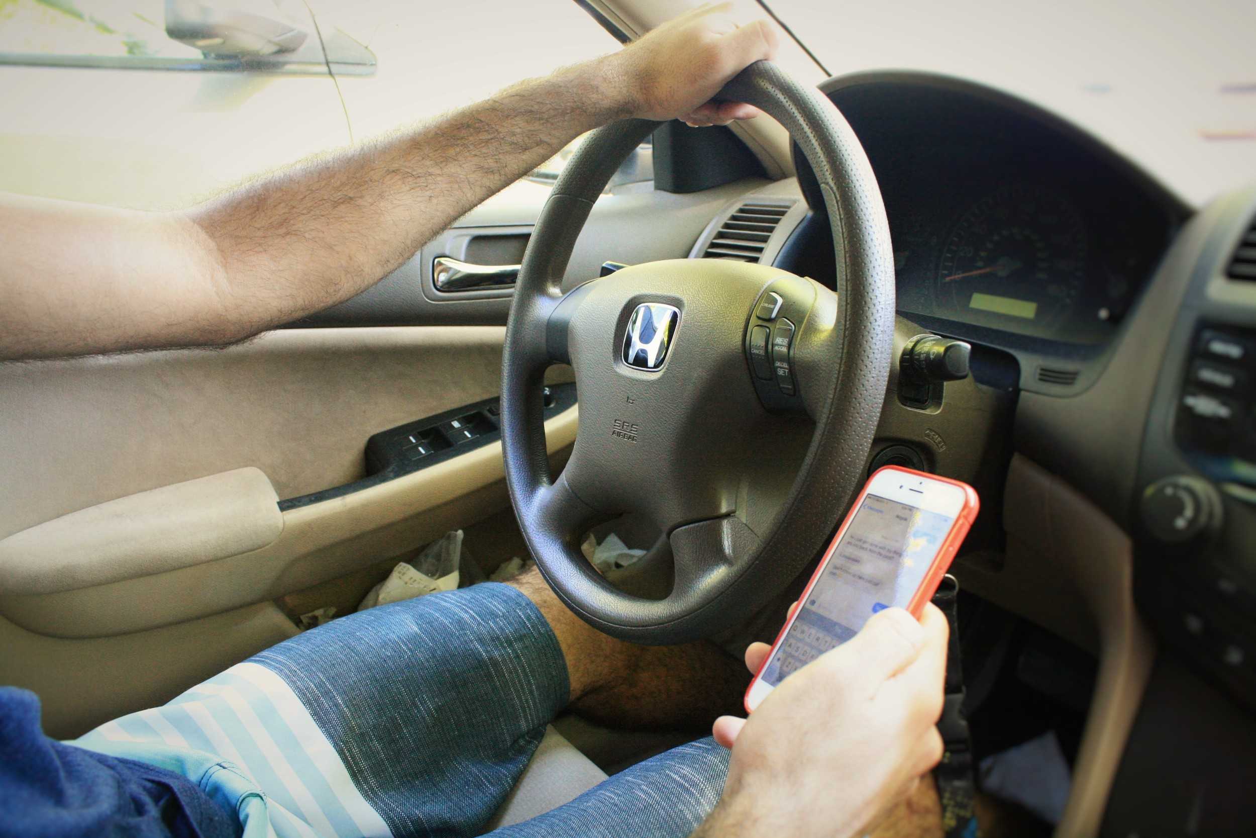 STAR // Niquie WilsonTexting while driving is a common occurence among college students and the most recent media campaign, #JustDrive discourages distracted driving.