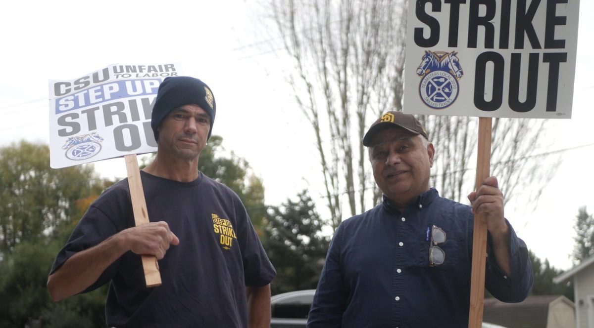 Kevin Dahlstedt, painter (left) and Celestino Martinez (right), protesting in front of SSU.