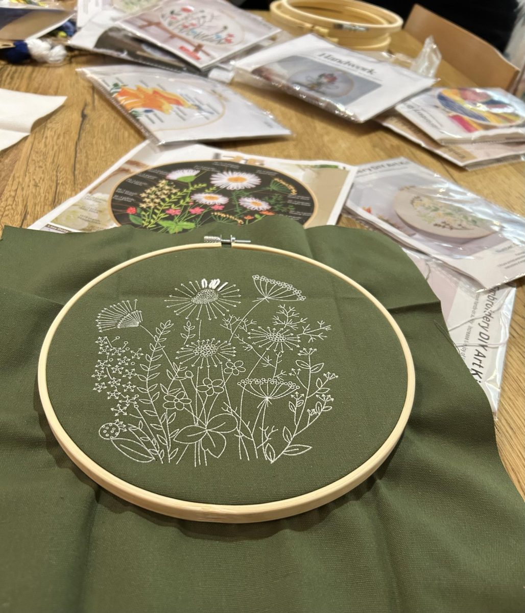 An embroidery project in progress on a table at W&B