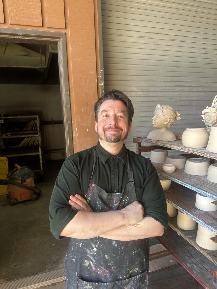 Professor Kowalczyk loading the kiln for a ceramic firing 