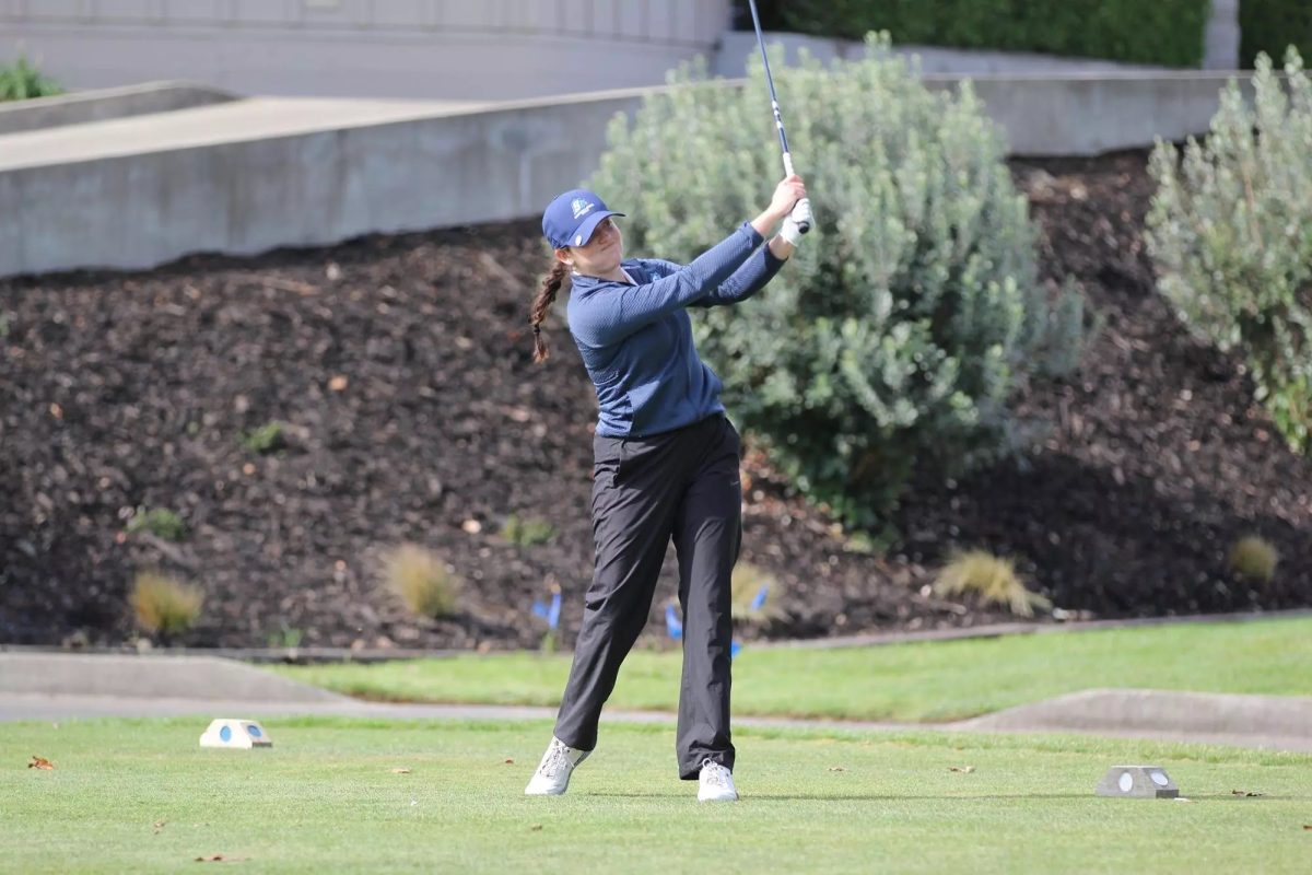 COURTESY | Sonoma State Athletics Lauren Garcia strikes her iron off the tee box for the Seawolves.