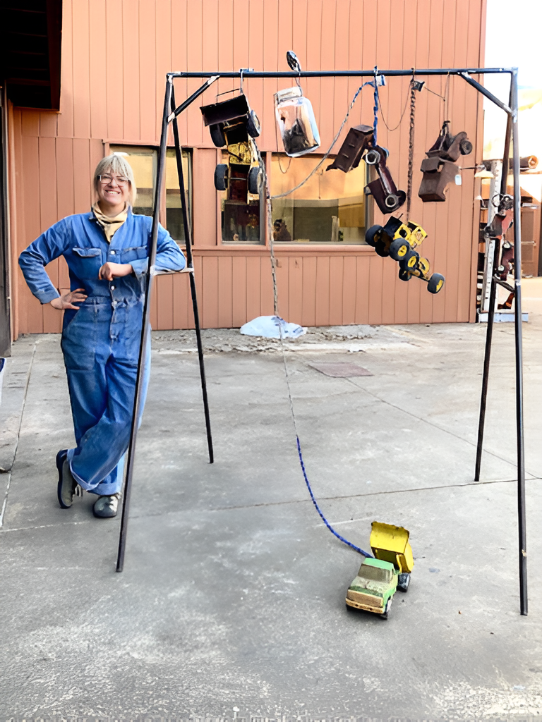 Philosophy Major Meg Whitener stands next to her piece ‘Boyhood’ at the SSU Outdoor Gallery.