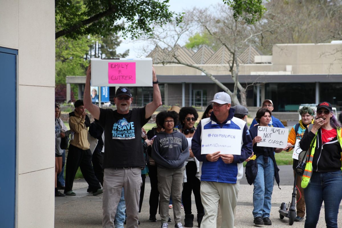 The California Faculty Association marched to give Interim President Emily Cutrer a banker's box with a "pink slip" so she can "clean out her desk" on April 17 following the "no-confidence" vote.