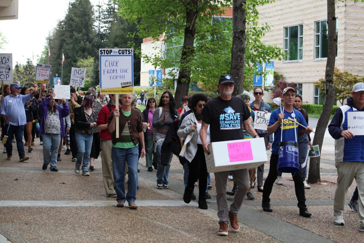 The California Faculty Association marched to give Interim President Emily Cutrer a banker's box with a "pink slip" so she can "clean out her desk" on April 17 following the "no-confidence" vote. 