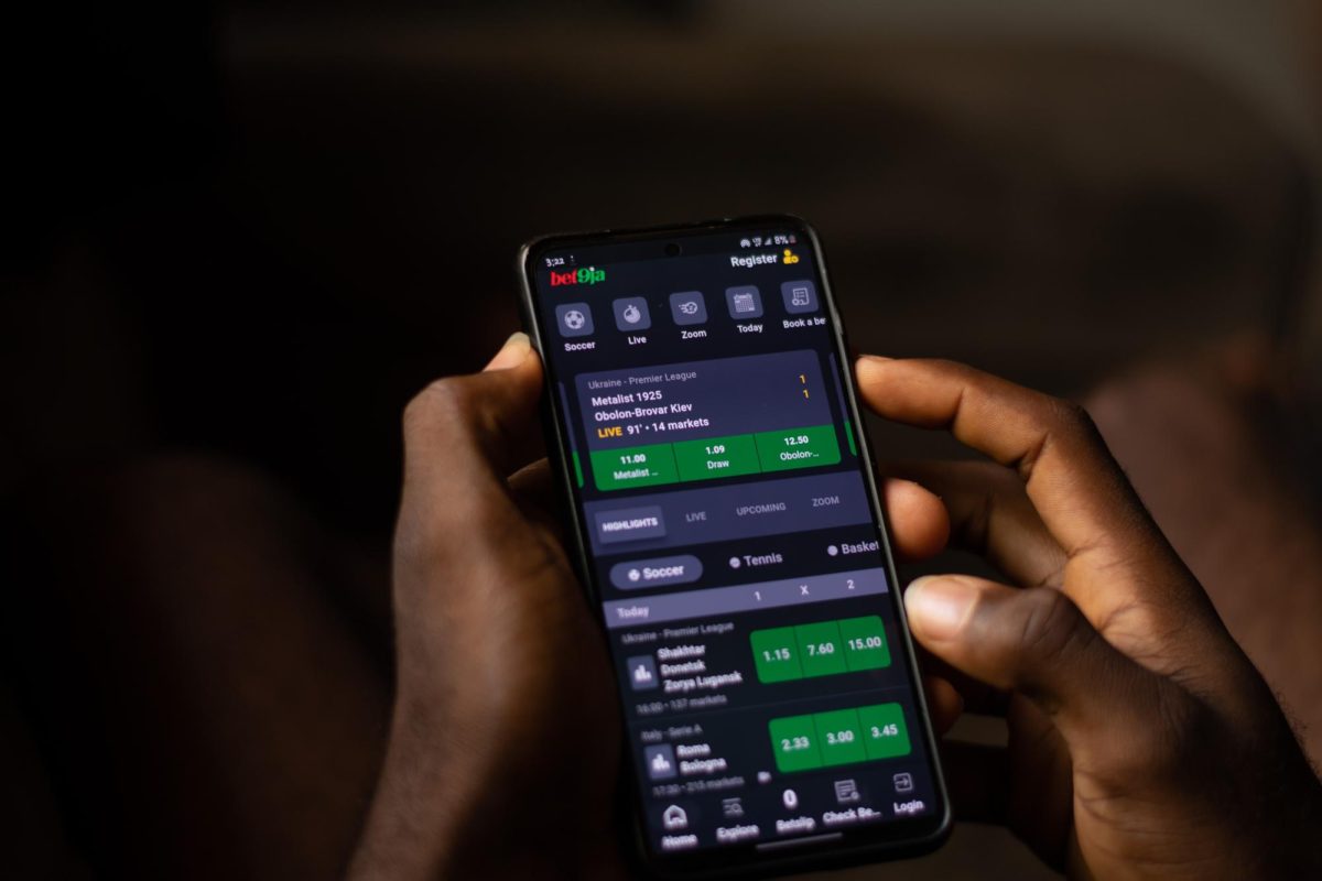 A person using the bet9ja sports gambling app.
