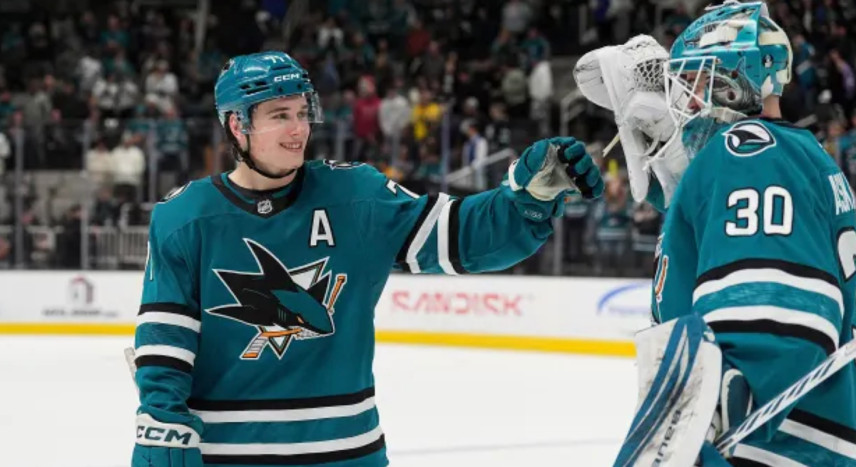 Macklin Celebrini of the San Jose Sharks celebrates after a score vs. the Montreal Canadiens.