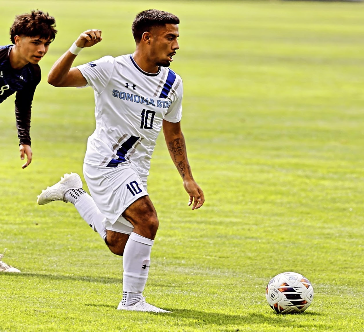 Jose Rios dribbling the ball